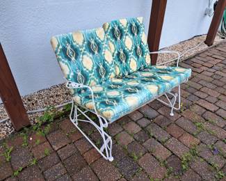 Vintage wrought iron loveseat glider 
With cushions $150