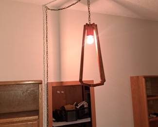 Close up of the swag light for complete office bedroom 