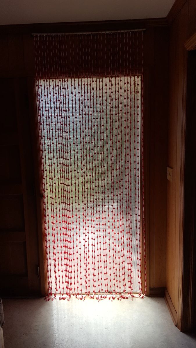 Beaded curtain for doorway.