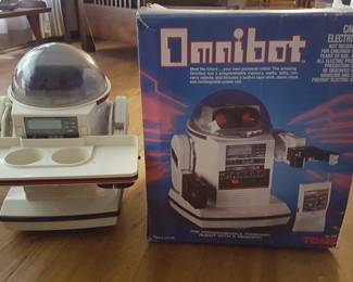 Omnibot (as is) missing remote and battery compartment has corrosion. 