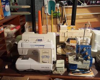 Lots of sewing machines and vintage notions 