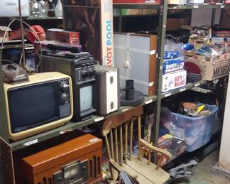 portable Sears yellow t v, small refrigerator (works) child's rocker. radio turntable and cassette player (as is)