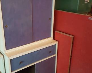 cabinets and Formica  red table top with leaf. 