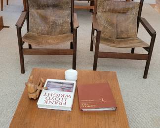 Michael Arnoult Rosewood leather sling chairs. The chair on the left has a repair to the leather that is barely noticeable and will be priced for significantly less. 