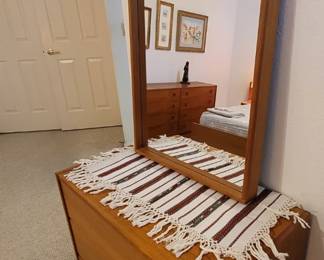 Danish Modern 3 drawer teak chest and large Jesper teak rectangular wall mirror. The mirror does not go with the chest we just put them together in the picture but could if you wanted it to,  most likely you'd want to hang it above the bed or the longboy dresser!