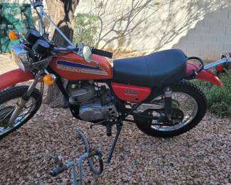 1974 Suzuki motorcycle with clean title! Runs good but does have a small leak in the carburetor. 