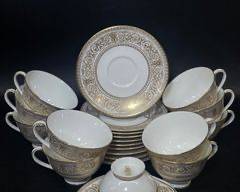 ROYAL DOULTON FINE ENGLISH BONE CHINA SOVEREIGN WHITE AND GOLD SET OF CUPS SND SAUCERS
