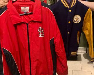 Vintage cardinals jacket and vintage child’s Vikings jacket