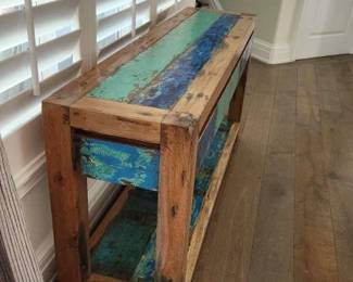 Wooden credenza with green and blue painted slats