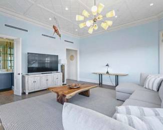 All items featured available. Couch with chase lounge,  wood slab coffee table, TV stand, entry table