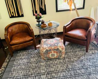 Pair of leather horseshoe club chairs 