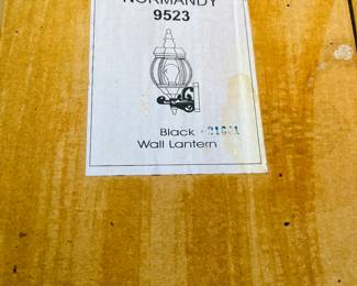 Collection of Normandy black wall lanterns in boxes