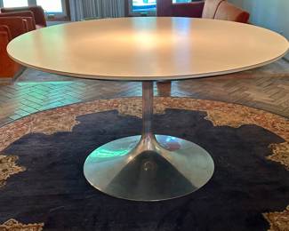 Custom Made Retro Mid Century Modern Dining Room Table featuring a chrome base and 53.5 inch round dining surface (measures 29" tall) 
