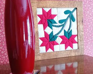 On the top of the dresser in bedroom 2