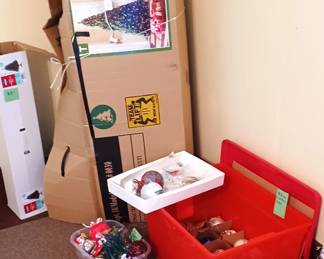 Large pre-lit Christmas tree and bulbs