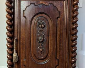 Close-up of the beautiful antique English chest, w/great carving and barley twist columns. 