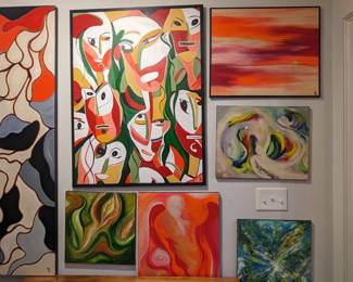 Entire wall of original oils on canvas, by resident artist, Amy Dandy. 