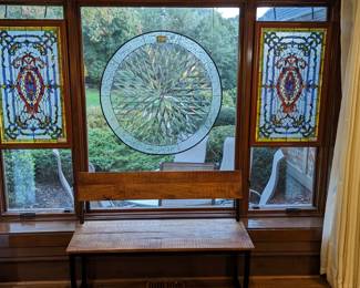 Wonderful 37" diameter leaded glass window and pair of stained glass panels, wood and wrought iron bench, another of the Amy Dandy original oil on canvas.