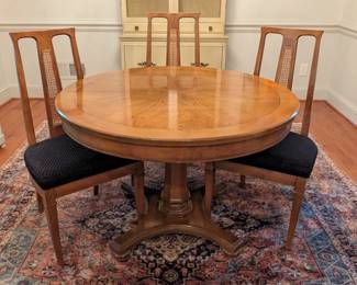 Vintage Union-National dining table with no leaves, in its round configuration. 