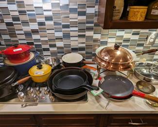 Yay, cookware! Yep, here you have a collection of vintage cast iron, All-Clad, Le Creuset and copper chafing dish for all of your upcoming holiday feasts.