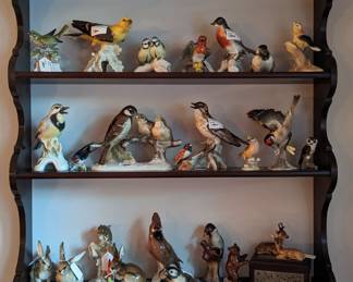 Vintage mahogany wall shelf, with porcelain figurine collection, by Hutschenreuther, Goebel and Royal Doulton. 