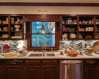 Kitchen full of useful smalls and decorative items, vintage wooden dough bowls, Italian ceramics, 1800's Rockford Silver Co., quad-plated quilted tea set, Royal Doulton figurines, vintage kitchen scale, vintage stainless Army size coffee pot and chicken fryer. 