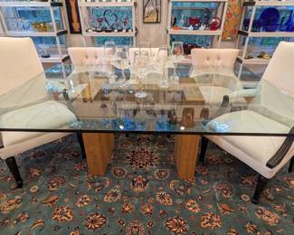 Wonderfully simple and elegant glass-topped dining table , w/set/6 upholstered dining chairs (pair of armchairs, 4 sides), set/6 custom-designed "Magnolia" boron glass chalices by Hans Godo Frabel, atop a gorgeous Persian Kashan design Fine Pakistan  rug, measures 9' 10" x 13' 4".
