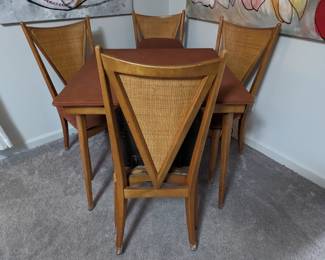 One of the chairs folded, back.