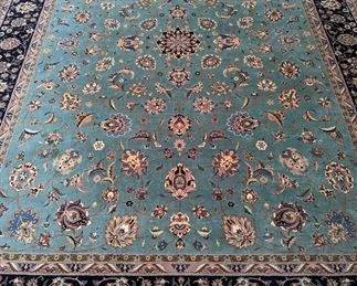 Feast your hungry eyes on this gorgeous Persian Kashan design Fine Pakistan  rug, measuring 9' 10" x 13' 4".