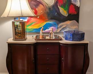 Wood buffet, with marble top, Asian tea tin table lamp, porcelain Mary, Joseph and baby Jesus, by Goebel, antique English oak/beveled mirror serving tray, w/ double handles, custom made 12" octagonal lapis lazuli box, w/lid and original oil on canvas, by Amy Dandy. 