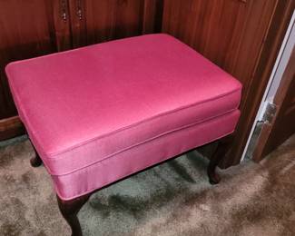 Pair of rose colored ottomans
