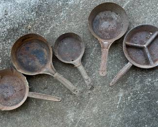 Several styles and sizes of cold hand frying pans