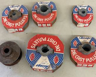 Several sizes new old stock Chicago die cast pulleys