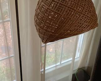 Wicker and brass floor lamp