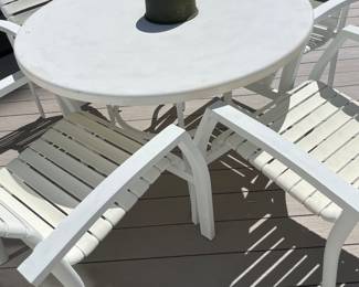 Patio furniture round table and four strap chairs