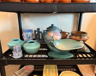 A variety of Roseville items.