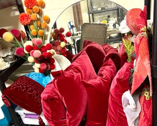 Christmas pillows and a large round mirror