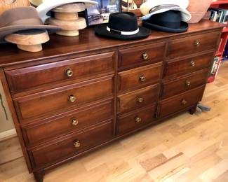Beautiful solid walnut Mirror Dresser with 12 individual drawers providing lots of storage.