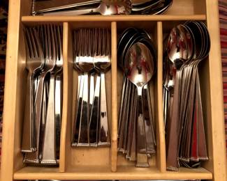 a nice stainless flatware set, unused.