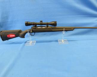 Lot 23. NIB Savage Axis XP 25-06 bolt action rifle.&nbsp; Includes Weaver 3 X 9 variable scope.&nbsp; Serial no. N889395