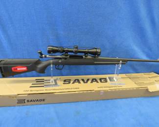 Lot 33. Savage Axis XP bolt-action 270 WIN rifle with a Weaver scope and box SN P040067. Appears to be in excellent condition