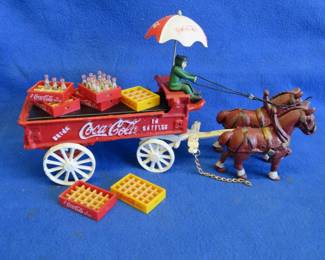 Lot 51. Coca-Cola Cast Iron Horse Drawn Wagon With Coke Cases