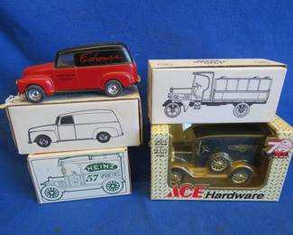 Lot 57. Four Ertl Die-Cast and Plastic Toy Car Banks