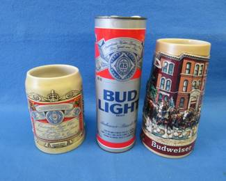 Lot 70. Two Budweiser steins and an untested novelty Bud Light telephone