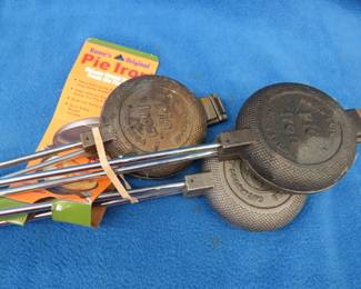 Lot 94. Three Pie Irons