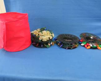 Lot 112. Christmas lights on reels.&nbsp; Includes storage bag.