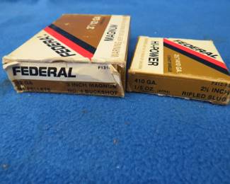 Lot 134. Five Federal 410 slugs and Three 12-gauge buckshot rounds