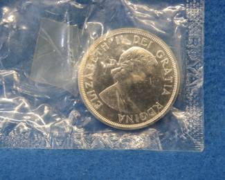Lot 174. 1964 uncirculated Canadian silver dollar