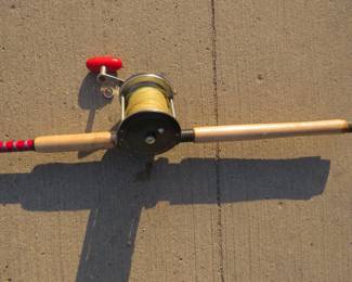 Lot 197. Nine-foot "Whuppin' Stick" rod with a Penn Long Beach #68 reel