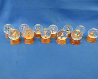 Lot 202. Twelve Disney snow globes